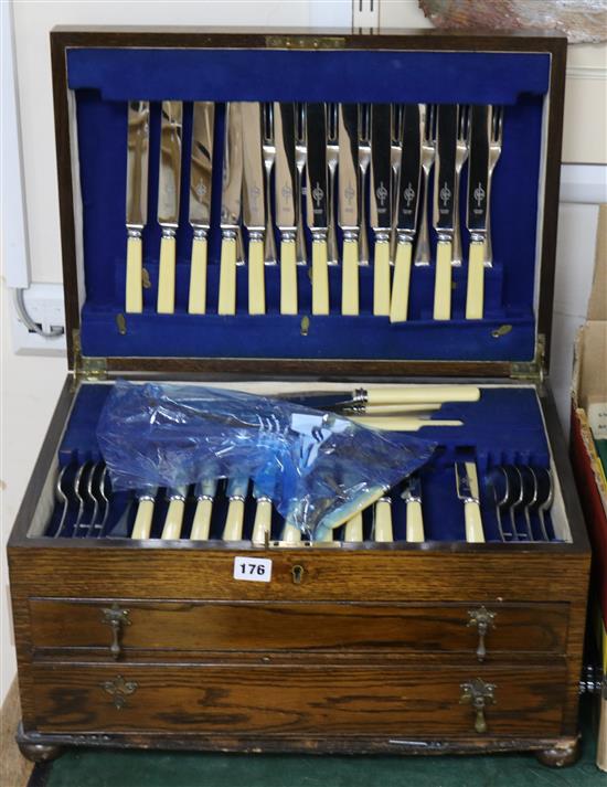 A 1920s oak canteen of plated flatware